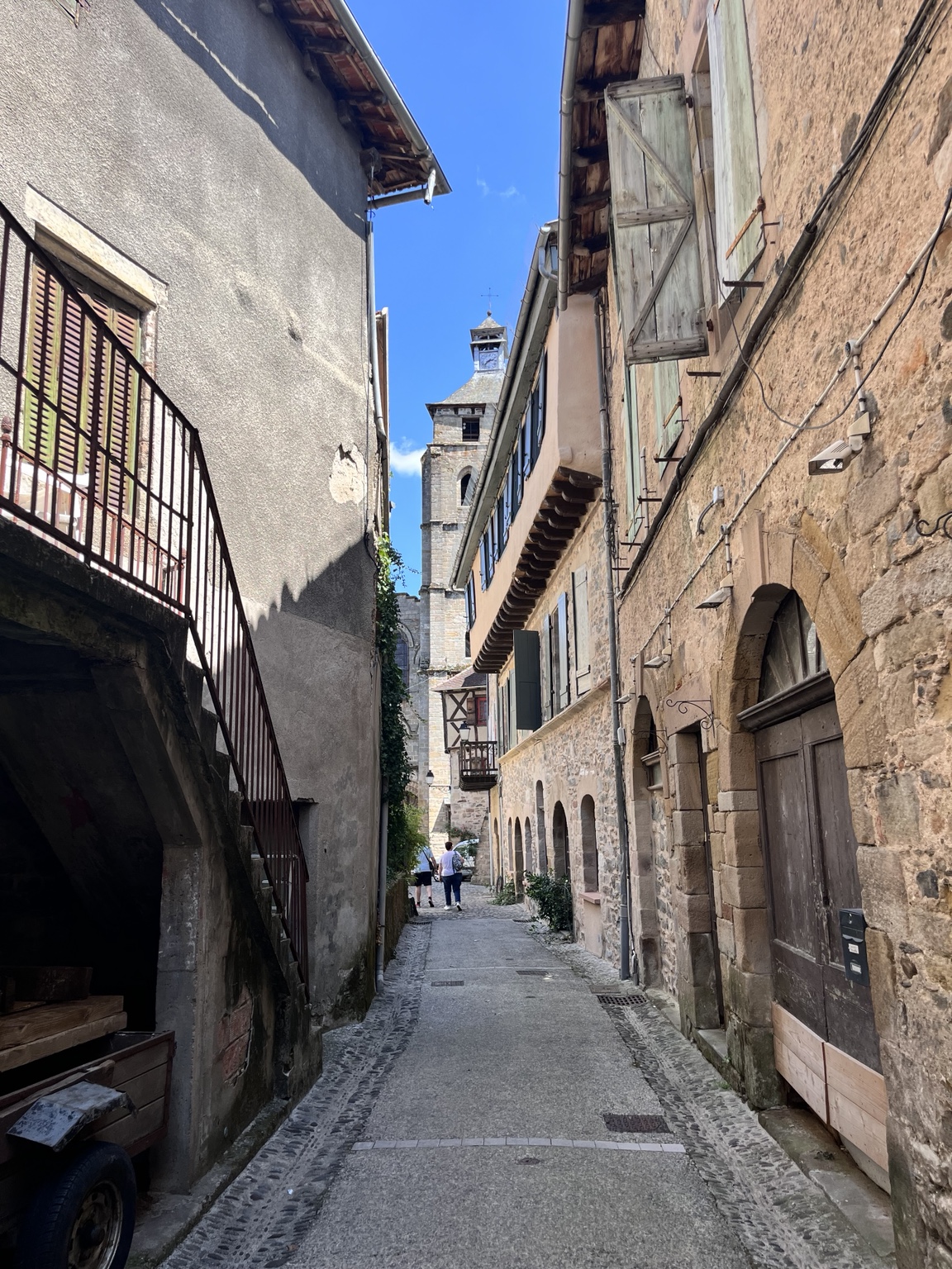 A narrow stone street in a village in rural southwest France